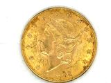 an image of a gold coin with a woman ' s head on it