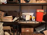 many boxes and boxes on the shelves in the room