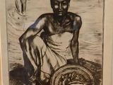 tableau représentant un homme assis sur la plage avec un panier de poissons