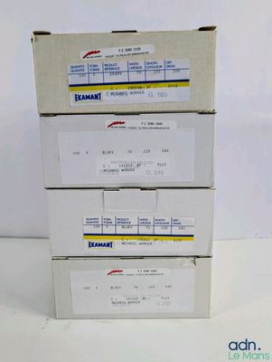 three boxes with labels on them are stacked on top of each other