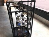 a wine rack that has a lot of bottles on it