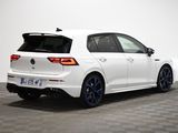 the rear end of a white volkswagen golf r - line