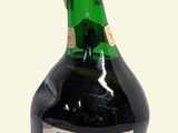 a bottle of wine that is sitting on a table