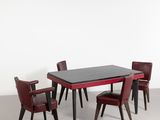 an image of a table and chairs in a room with a white wall