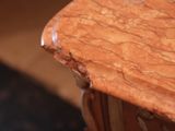 a close up of a table with a marble top