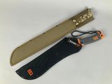 a knife that is laying on a table next to a knife