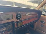 a dashboard of a car with a clock on it