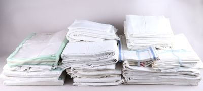 a stack of folded towels sitting on a table