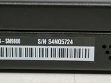 a close up of a laptop with a barcode on it