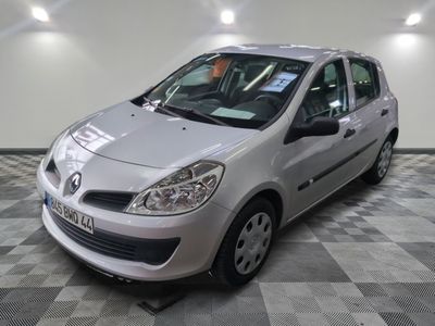 a picture of a silver car parked in a showroom