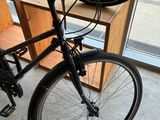 a bicycle with a basket on the back of it
