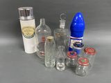 many bottles and containers that are sitting on a table