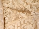 a close up of a dress with lace on it