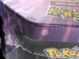 a close up of a box of pokemon cards on a table