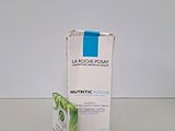 the bottle of la roche - posay nutritc intense cream is next to the box