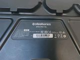 a close up of a laptop with a cable attached to it