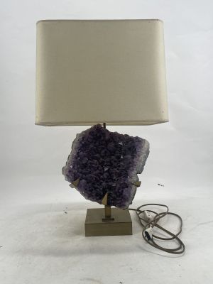 purple amethorate lamp with a white shade on a metal base