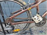 a close up of a bicycle with a chain attached to it
