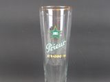 a tall glass with a green star on it