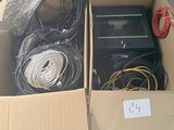 two boxes of wires and wires are sitting on a table