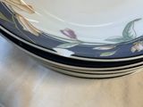 a stack of plates sitting on top of a table