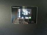 a digital display on the side of a refrigerator