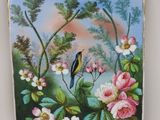 un tableau représentant un oiseau perché sur une branche d'arbre