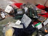 a pile of clothing that is sitting on the floor