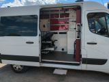 an image of a white van with its doors open