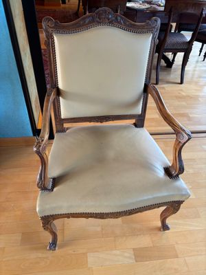 an image of a chair that is on a hard wood floor