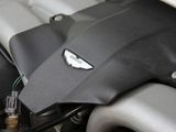 a close up of a car ' s engine with the hood open