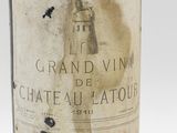 a bottle of wine that is sitting on a table