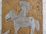 an image of a tile with a horse and a man on it