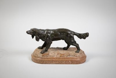 bronze statue of a dog on a marble base on a white background
