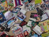 a lot of cards on the floor of a room