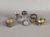a lot of silver objects that are on the table