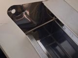 a toaster oven sitting on top of a white counter