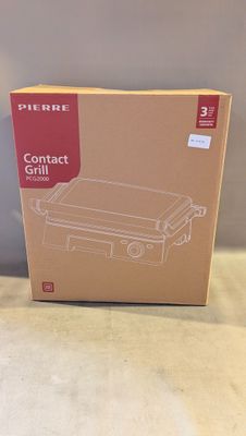 Emballage d'une boîte de grills de table posée sur une table