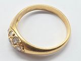 an image of a close up of a ring on a white surface