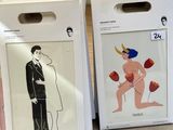two boxes with pictures of a man and a woman on them