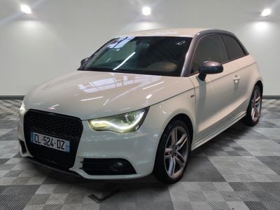 an image of a white audi car in a showroom
