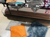 a glass table with a lot of different items on it