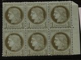 quatre timbres représentant des visages de femmes sur un fond noir