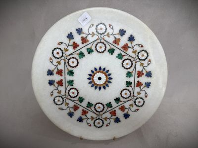 an image of a white plate with a floral design on it