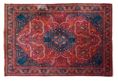 un tapis rouge et bleu sur fond blanc