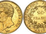 a gold coin with a woman ' s head on it