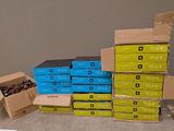 a pile of boxes and a box of chocolates on the floor