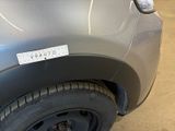 a close up of a car with a sticker on the front of it