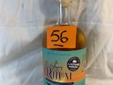 a bottle of liquor with a price tag on it