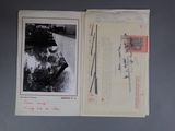 an open book with a picture of a man in a hat on it